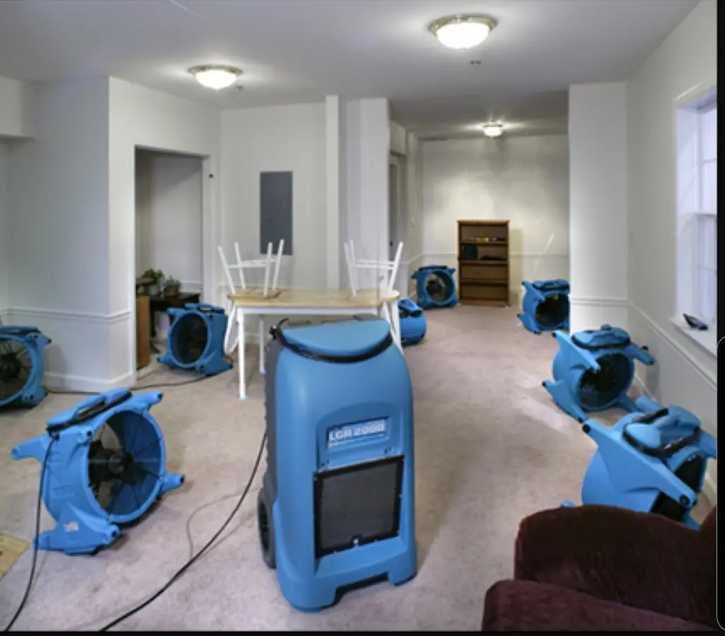 Air movers and dehumidifier setup for Water Damage Restoration in Plano